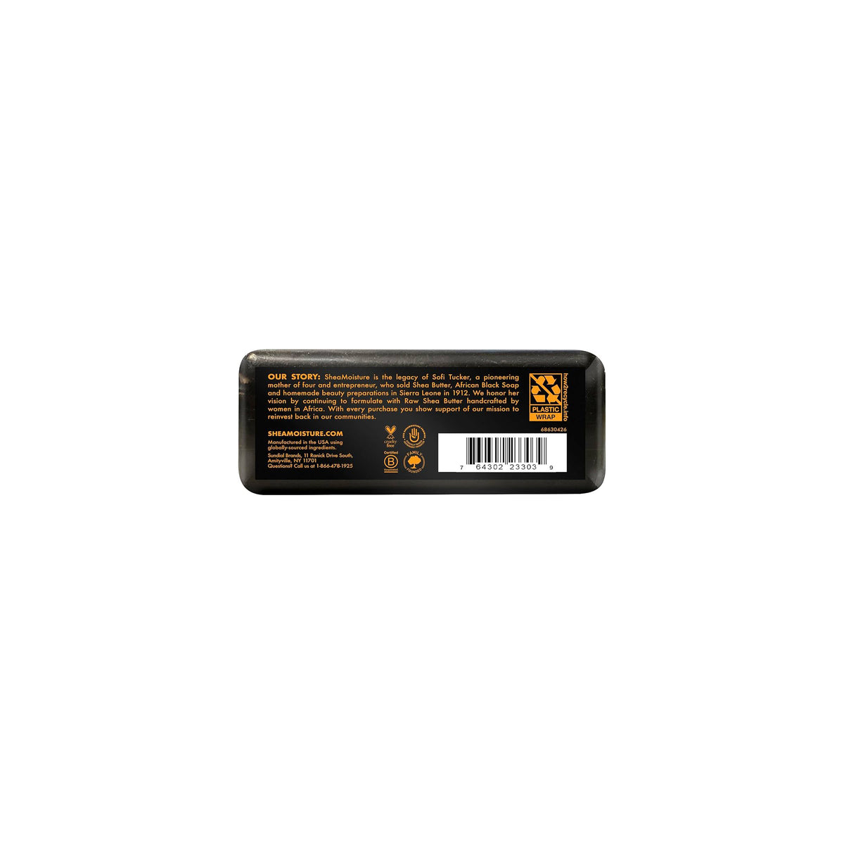 Bagersiden af en Shea Moisture African Black Soap sæbe. Indeholder information om produktet, ingredienser og virksomhedens historie.